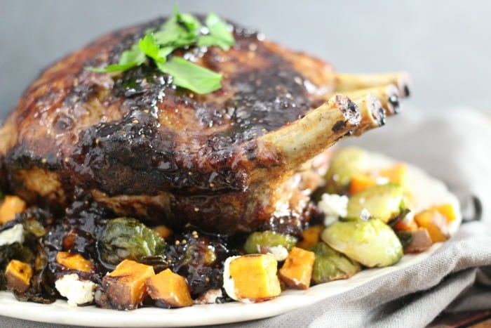 Fig Glazed Rack of Pork with Roasted Brussels Sprouts and Sweet Potatoes Recipe