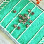PLAYERS ON FOOTBALL FIELD CAKE