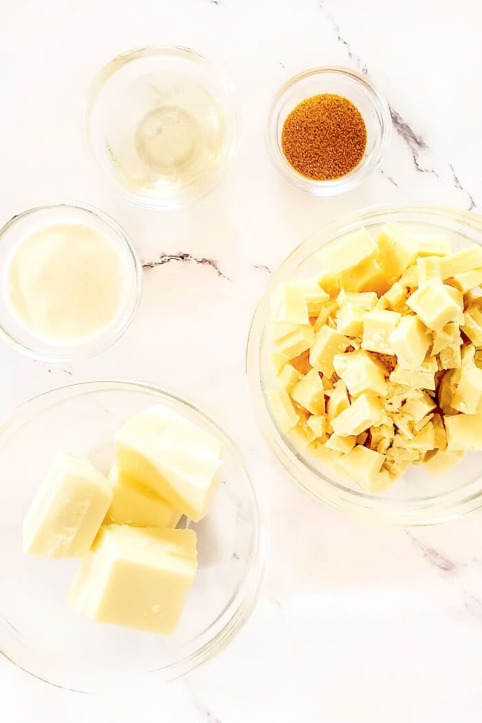 Champagne truffles are a decadent dessert made with white chocolate, cream and champagne topped with gold sprinkles for extra fancy flair! CHAMPAGNE TRUFFLES INGREDIENTS