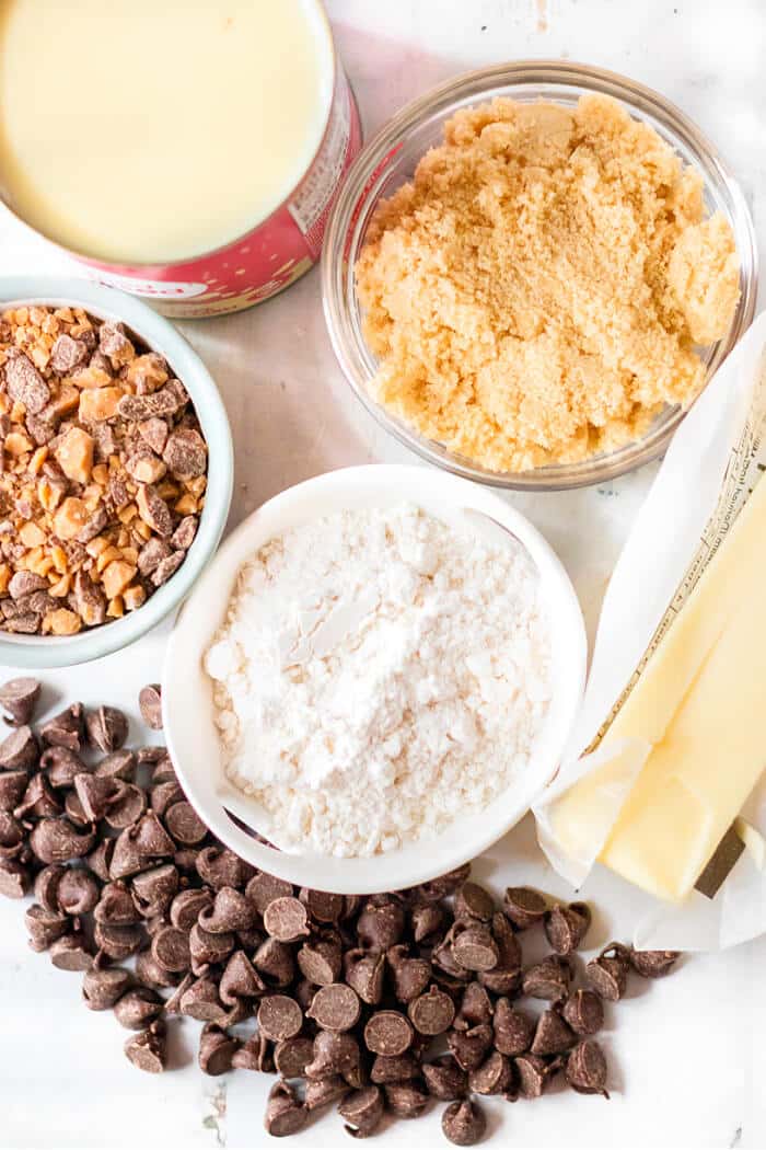 Chocolate toffee bars made with butter, brown sugar, sweetened condensed milk, chocolate chips & toffee are a delicious grab and go treat! CHOCOLATE TOFFEE BAR INGREDIENTS