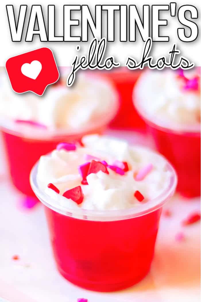 Valentine’s jello shots are a festive layered shot of raspberry and strawberry jello topped with whipped cream & sprinkles! EASY VALENTINE'S JELLO SHOTS