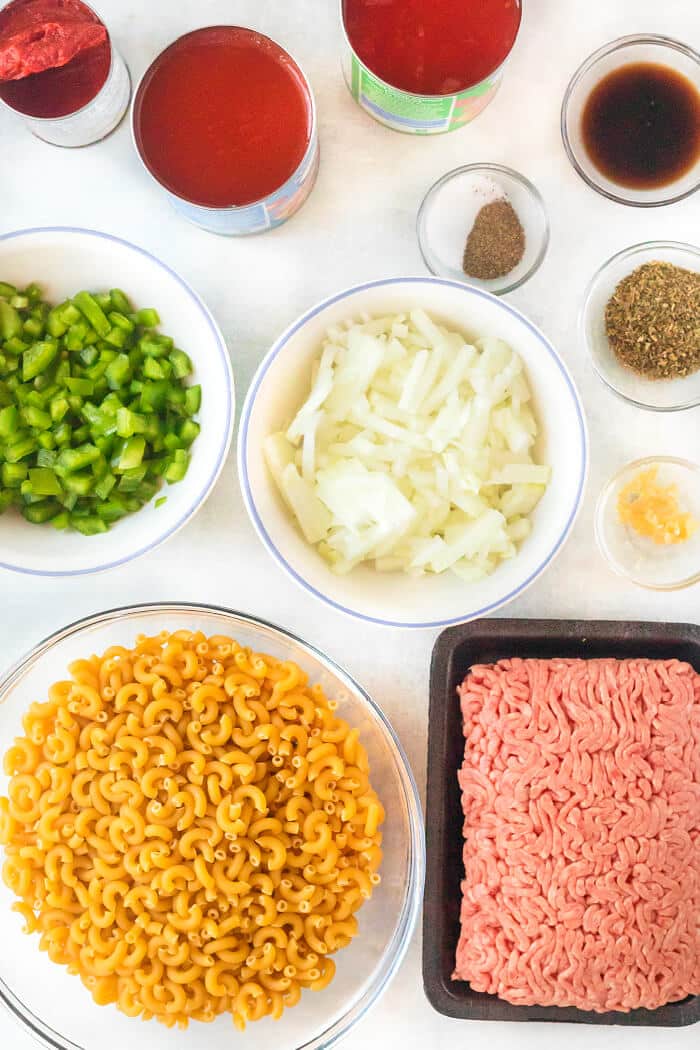 Goulash (American Chop Suey) is a classic comfort food made with macaroni, bell peppers, garlic, beef, Worcestershire, and diced tomatoes. GOULASH INGREDIENTS