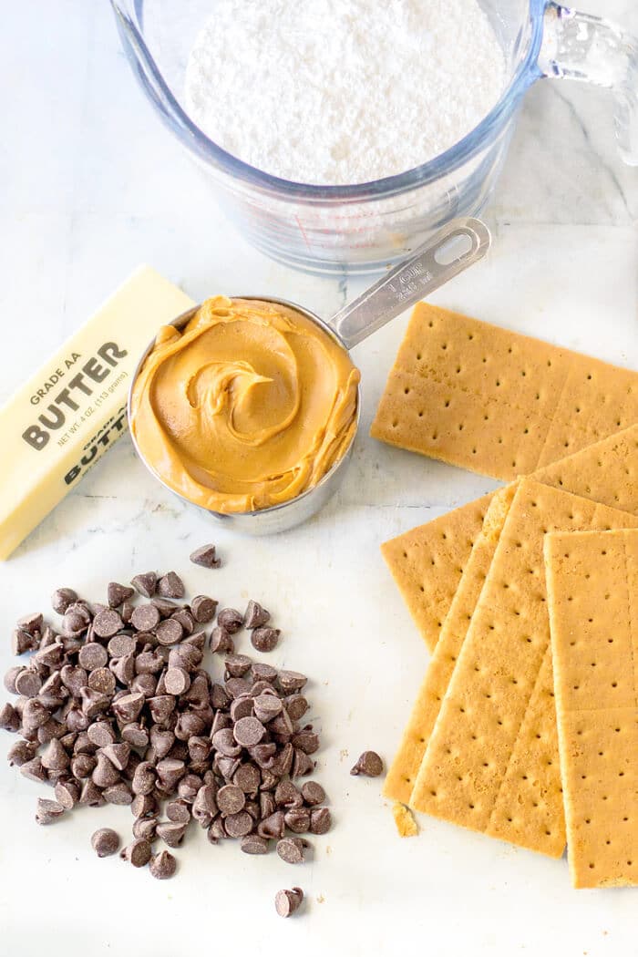 Peanut butter bars are a classic no bake peanut butter chocolate dessert bar we all know and love, they're delicious nostalgia! PEANUT BUTTER BAR INGREDIENTS