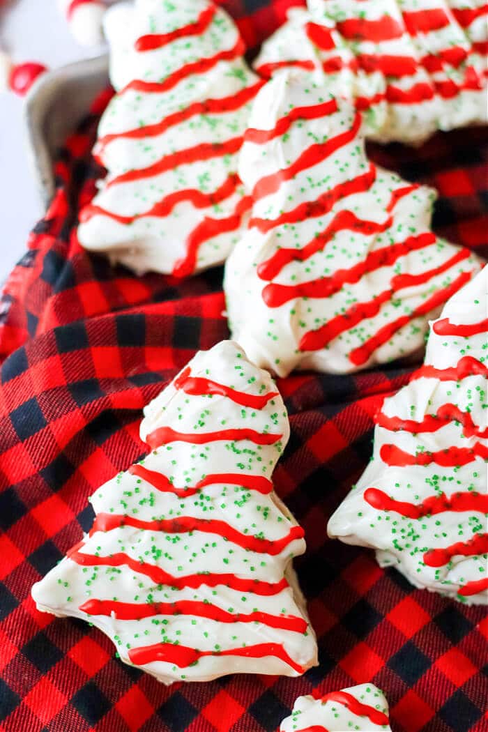 Peanut butter Christmas trees are fun treats peanut butter chocolate treats full of holiday cheer. They're even better than Reeses! PEANUT BUTTER CHRISTMAS TREES