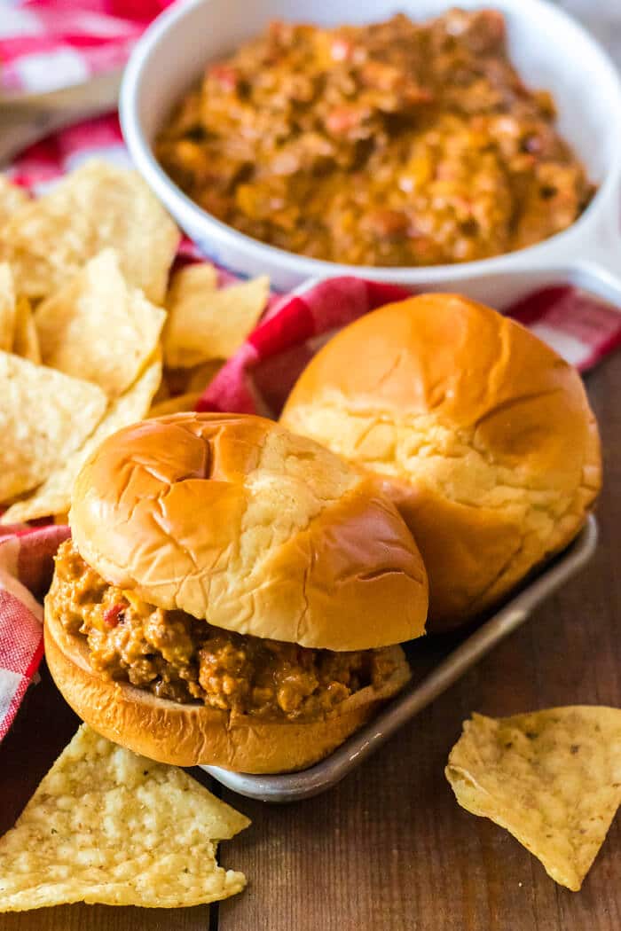 Nacho sloppy joes are a fun spin on the everyone's favorite sloppy sandwich made with ground beef, taco seasoning and melted cheese! RECIPE FOR NACHO SLOPPY JOES