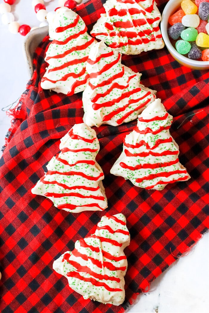 Peanut butter Christmas trees are fun treats peanut butter chocolate treats full of holiday cheer. They're even better than Reeses! RECIPE FOR PEANUT BUTTER CHRISTMAS TREES
