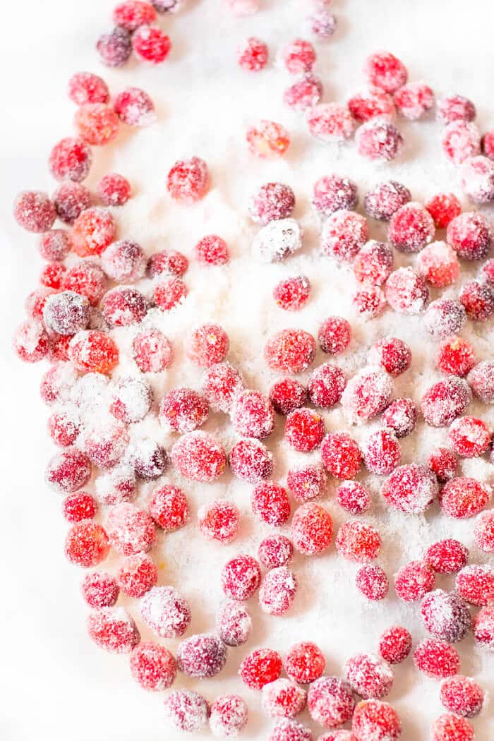 Sugared cranberries are incredibly easy to make, the perfect combo of sweet and tart and a beautiful garnish for your holiday recipes! SUGARED CRANBERRIES