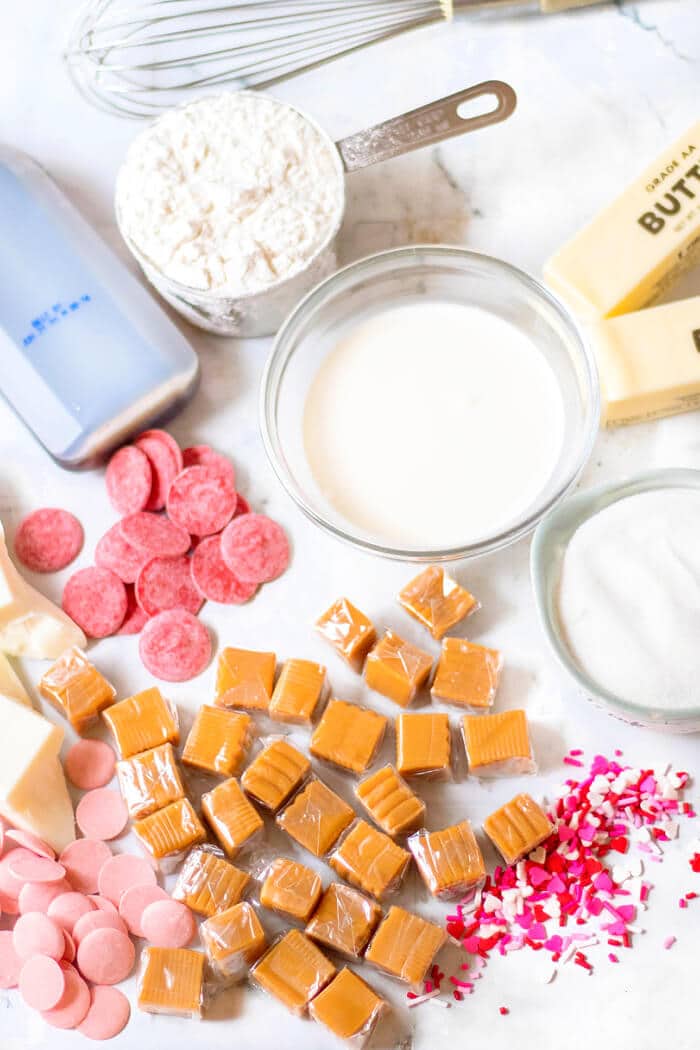 Valentine’s millionaire bars are a layered dessert made with shortbread, caramel, creamy chocolate and topped with Valentine sprinkles! VALENTINE'S MILLIONAIRE BARS INGREDIENTS