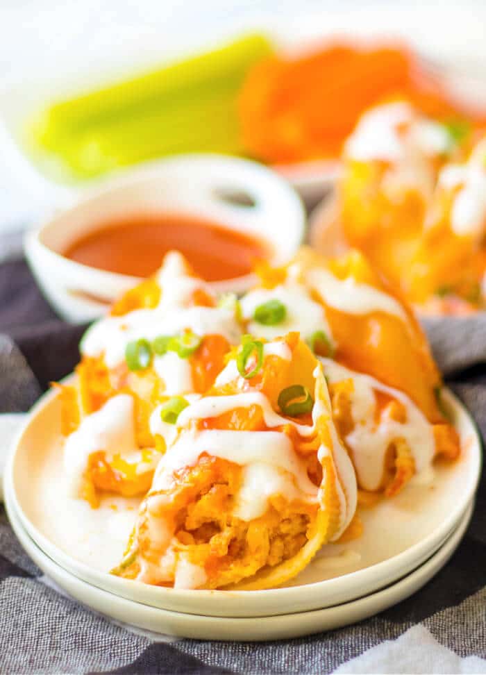 Buffalo chicken stuffed shells are jumbo pasta shells stuffed with cheesy chicken and wing sauce, it's the perfect fusion meal! BUFFALO CHICKEN STUFFED SHELLS RECIPE