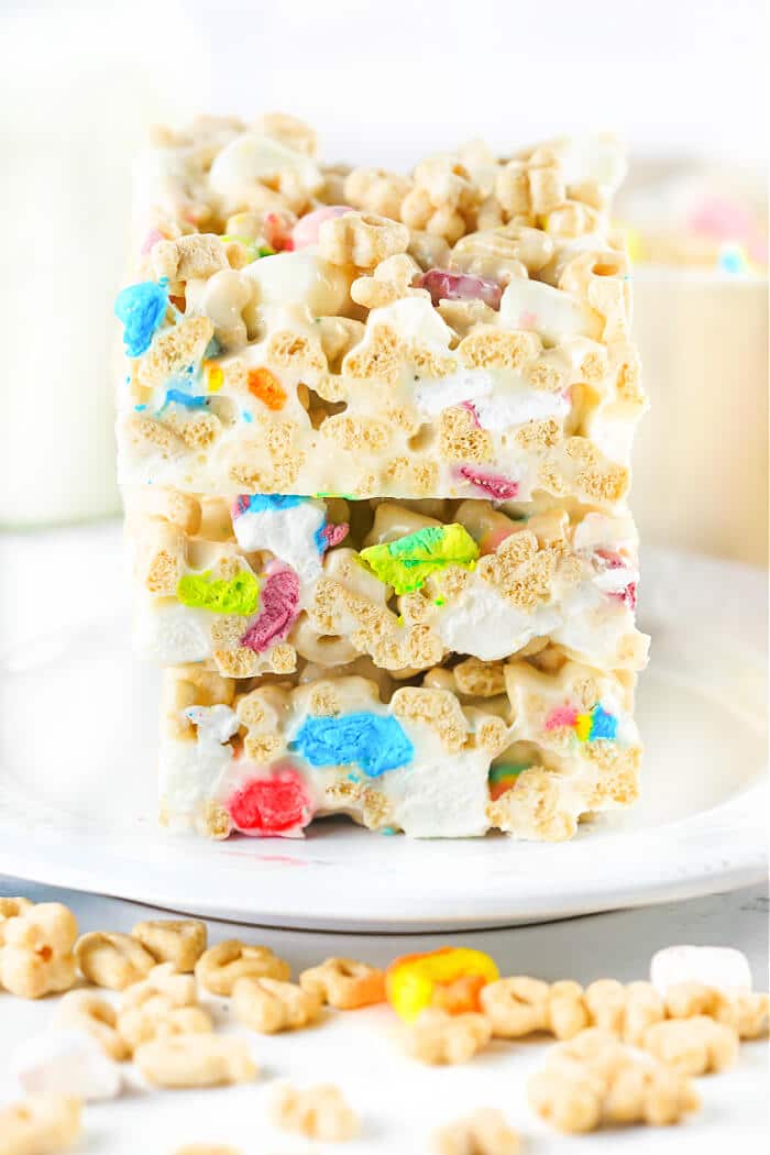Lucky Charms rice krispie treats are a fun spin on the classic treats made with Lucky Charms cereal for a colorful and yummy dessert! LUCKY CHARMS KRISPIE TREATS