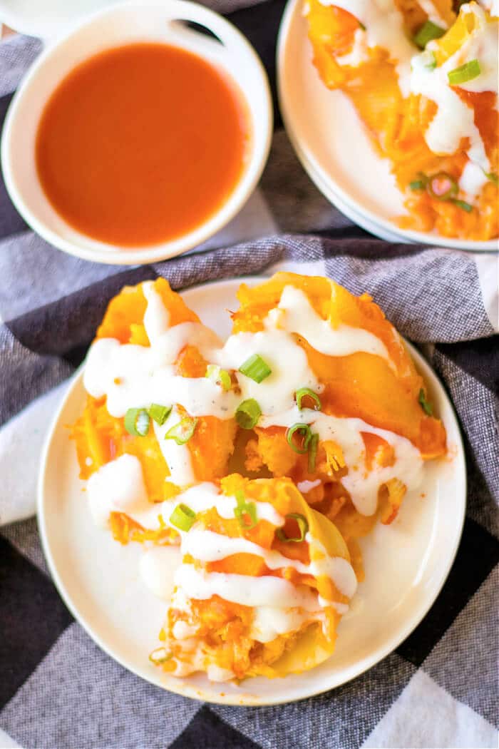 Buffalo chicken stuffed shells are jumbo pasta shells stuffed with cheesy chicken and wing sauce, it's the perfect fusion meal! RECIPE FOR BUFFALO CHICKEN STUFFED SHELLS