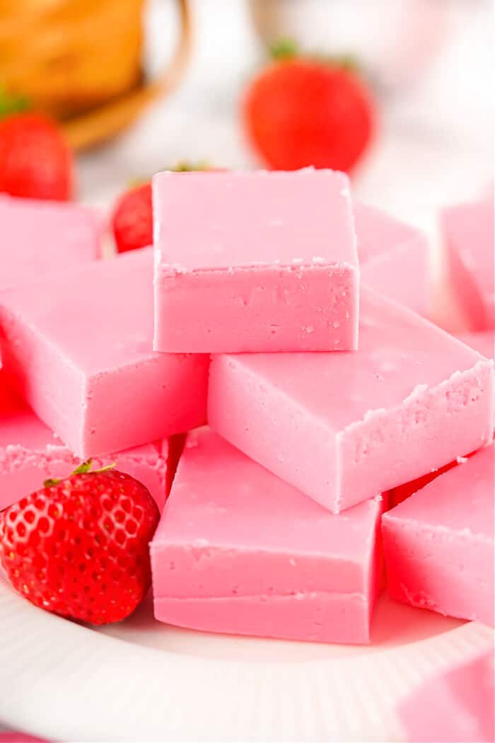 Strawberry fudge is melt in your mouth delicious and one of the easiest fudge recipes with just two simple ingredients! RECIPE FOR STRAWBERRY FUDGE