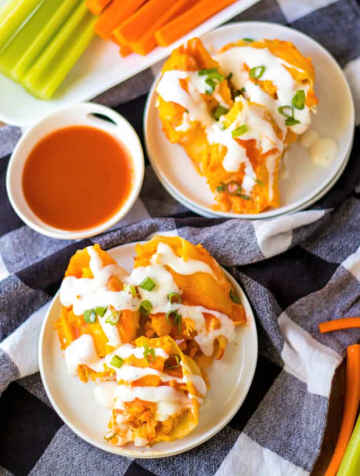 Buffalo chicken stuffed shells are jumbo pasta shells stuffed with cheesy chicken and wing sauce, it's the perfect fusion meal! STUFFED SHELLS BUFFALO CHICKEN