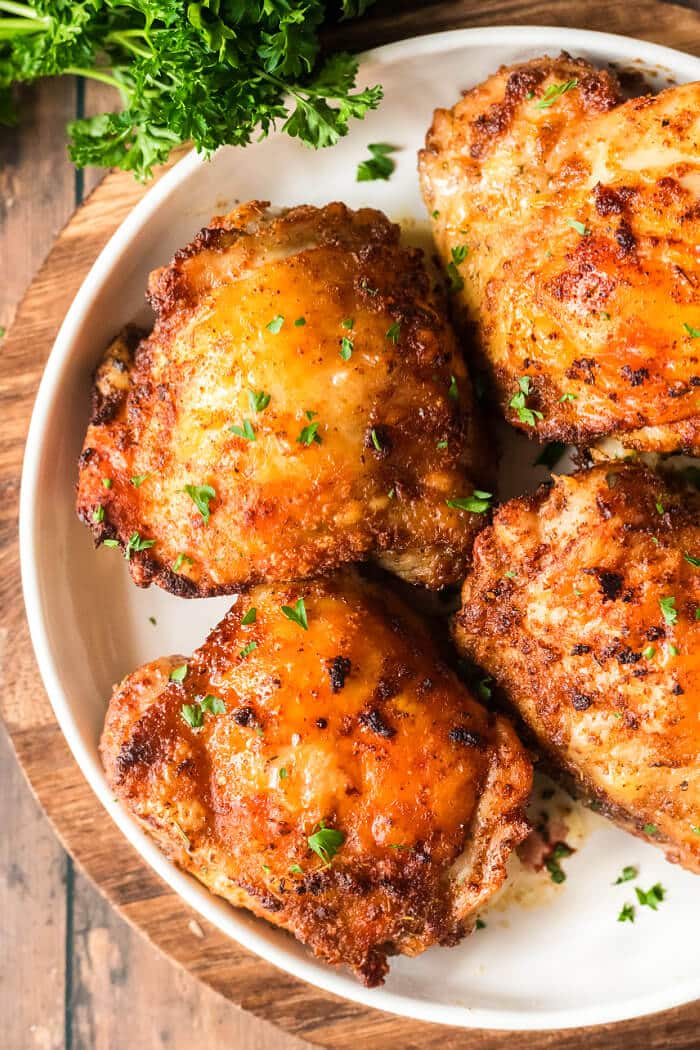 Air fryer chicken thighs are juicy and delicious and perfectly seasoned for a yummy and easy weeknight meal. CHICKEN THIGHS IN AIR FRYER