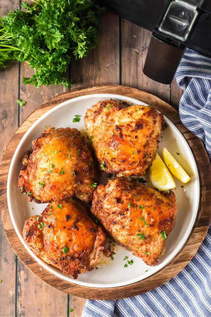 Air fryer chicken thighs are juicy and delicious and perfectly seasoned for a yummy and easy weeknight meal. CRISPY AIR FRYER CHICKEN THIGHS