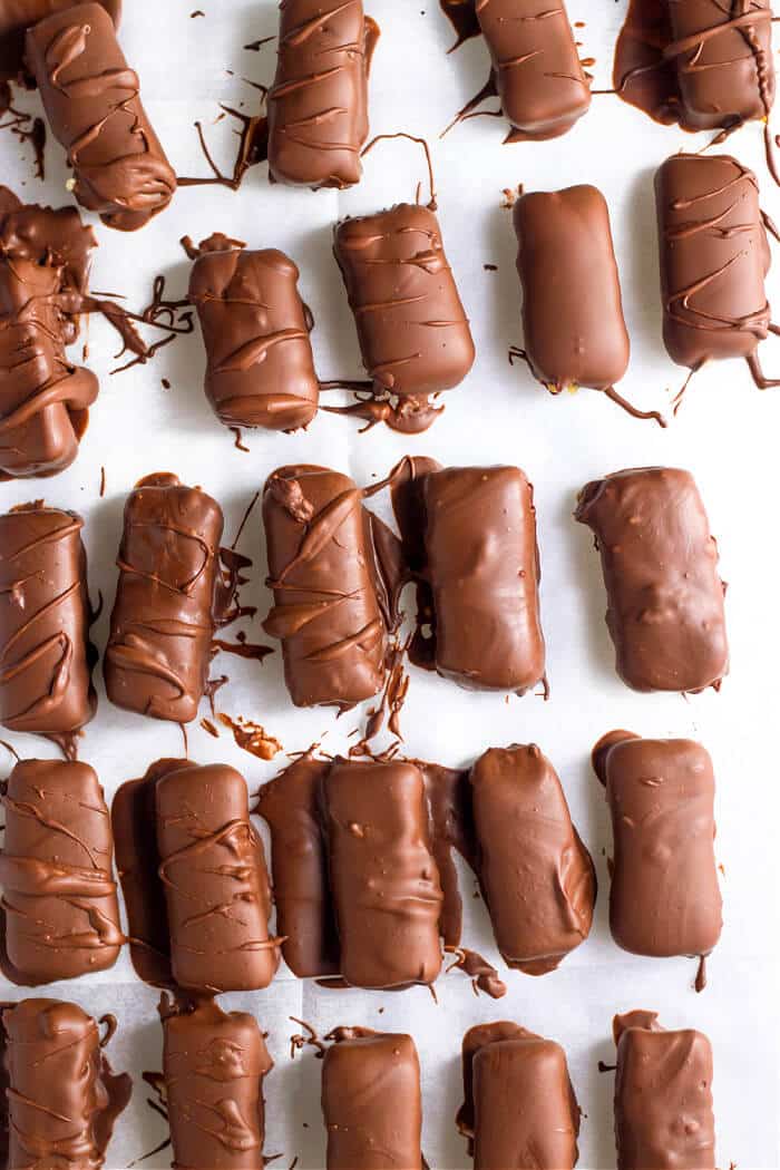 Homemade Twix bars are your favorite candy bar made right in your home with an easy shortbread, caramel, and melted chocolate! HOMEMADE TWIX