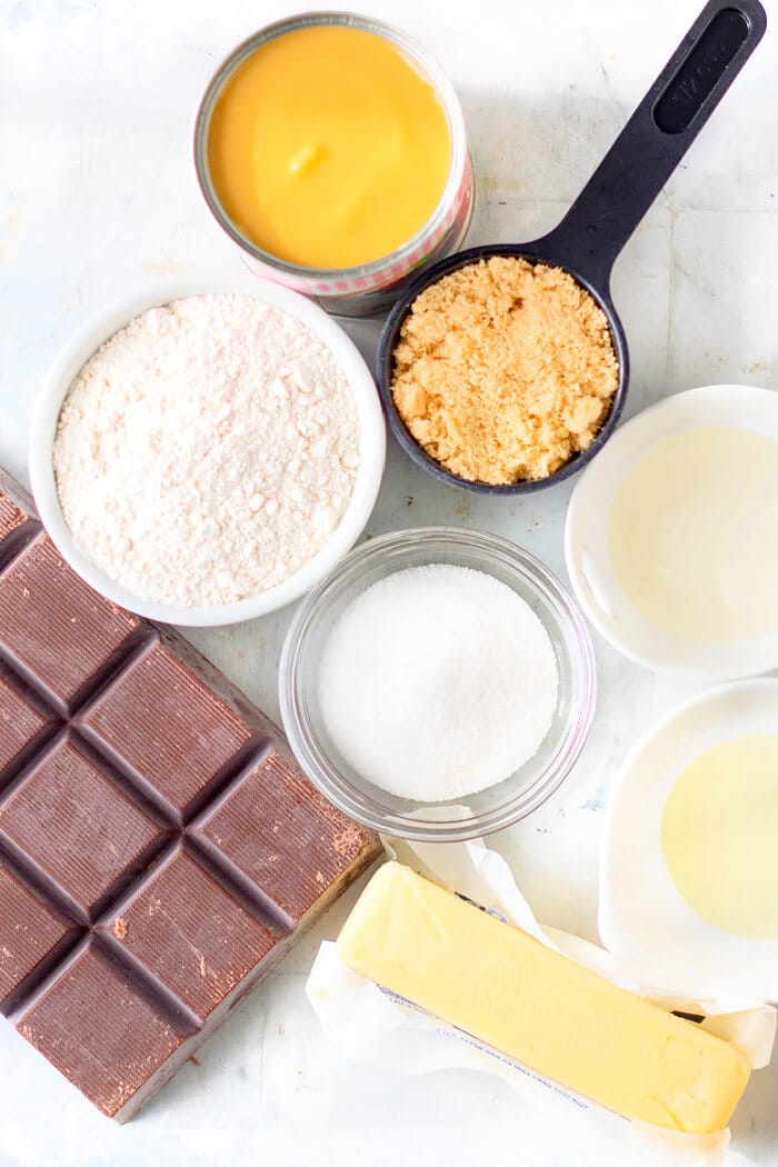 Homemade Twix bars are your favorite candy bar made right in your home with an easy shortbread, caramel, and melted chocolate! HOMEMADE TWIX BARS INGREDIENTS