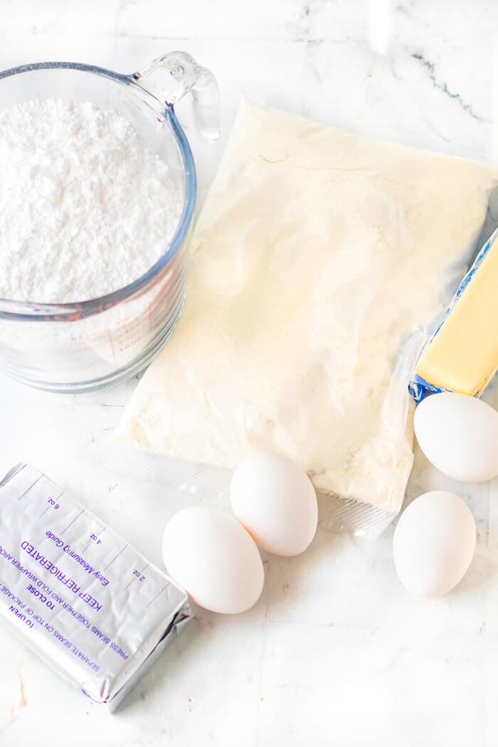 Lemon gooey butter cake is a sweet and tart treat made with lemon cake mix, cream cheese and powdered sugar! LEMON GOOEY BUTTER CAKE INGREDIENTS