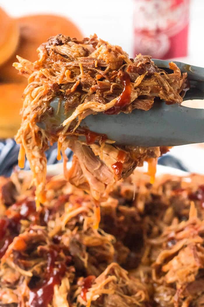 Dr. Pepper pulled pork is loaded with flavor from seasoning and Dr. Pepper and finished with BBQ sauce for an amazing weeknight meal. PULLED PORK DR PEPPER