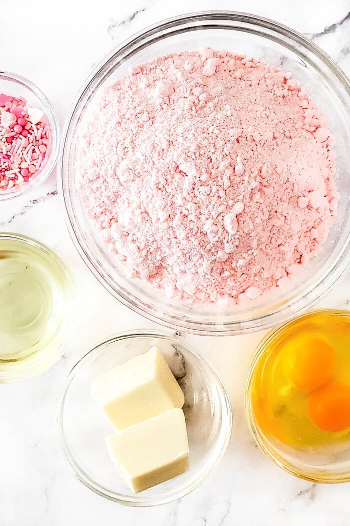 Strawberry cake mix cookies are soft, delicious, and the easiest cookies you'll make with only 3 simple ingredients! STRAWBERRY CAKE MIX COOKIE INGREDIENTS