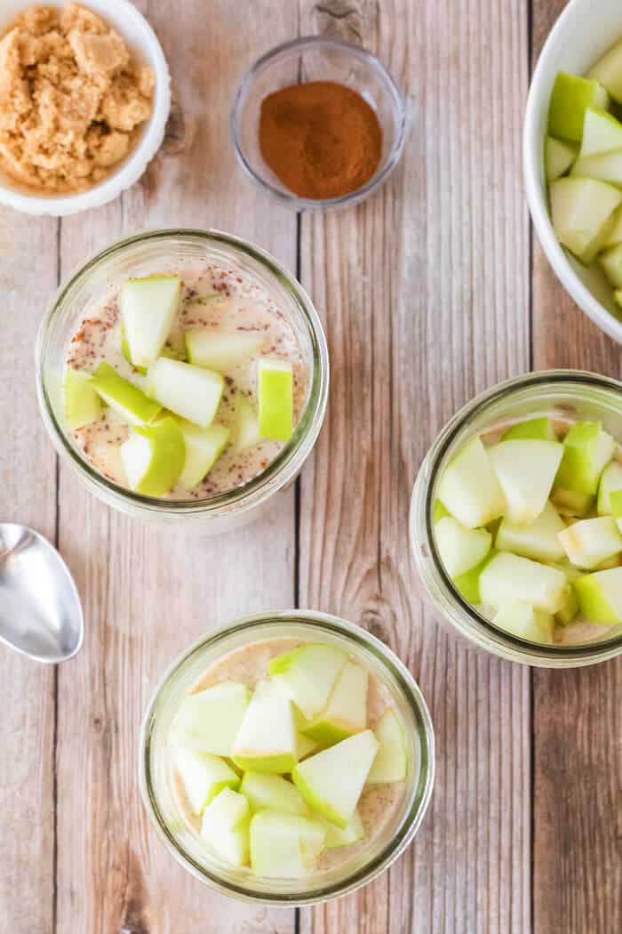 Apple cinnamon overnight oats are a great simple breakfast made with oats, milk, yogurt, brown sugar, cinnamon and chopped apples! APPLE CINNAMON OVERNIGHT OATS RECIPE
