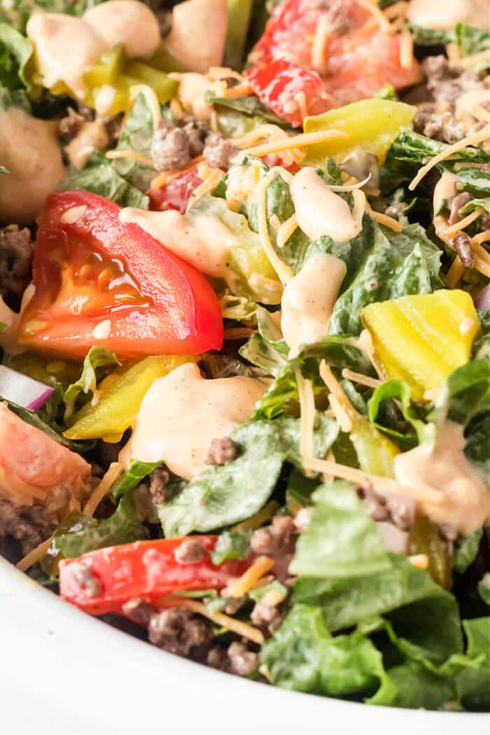 Big Mac salad is a fun spin on the classic burger served as a chopped salad with all the same great flavors including the secret sauce! BIG MAC SALAD BOWL