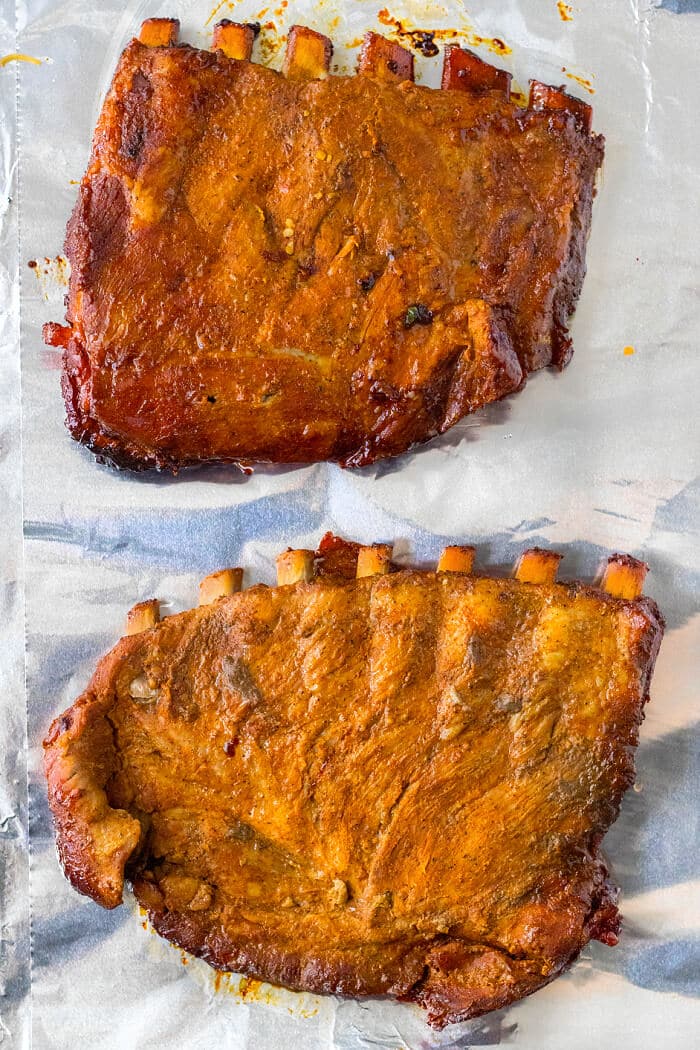 Slow cooker ribs are an easy and delicious way to have a tender and flavorful rack of ribs ready for supper at the end of a busy day! COOK RIBS IN CROCK POT