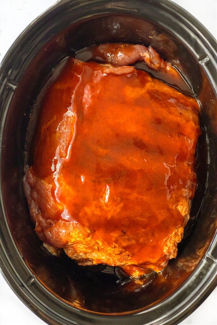Slow cooker ribs are an easy and delicious way to have a tender and flavorful rack of ribs ready for supper at the end of a busy day! COOK RIBS IN SLOW COOKER