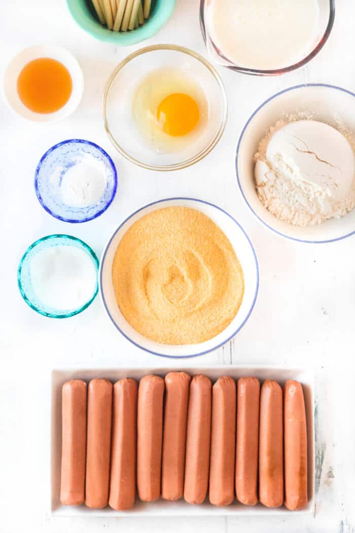 Homemade corn dogs are a delicious treat made with hot dogs, corn meal, buttermilk and honey for nostalgic perfection. CORN DOG INGREDIENTS