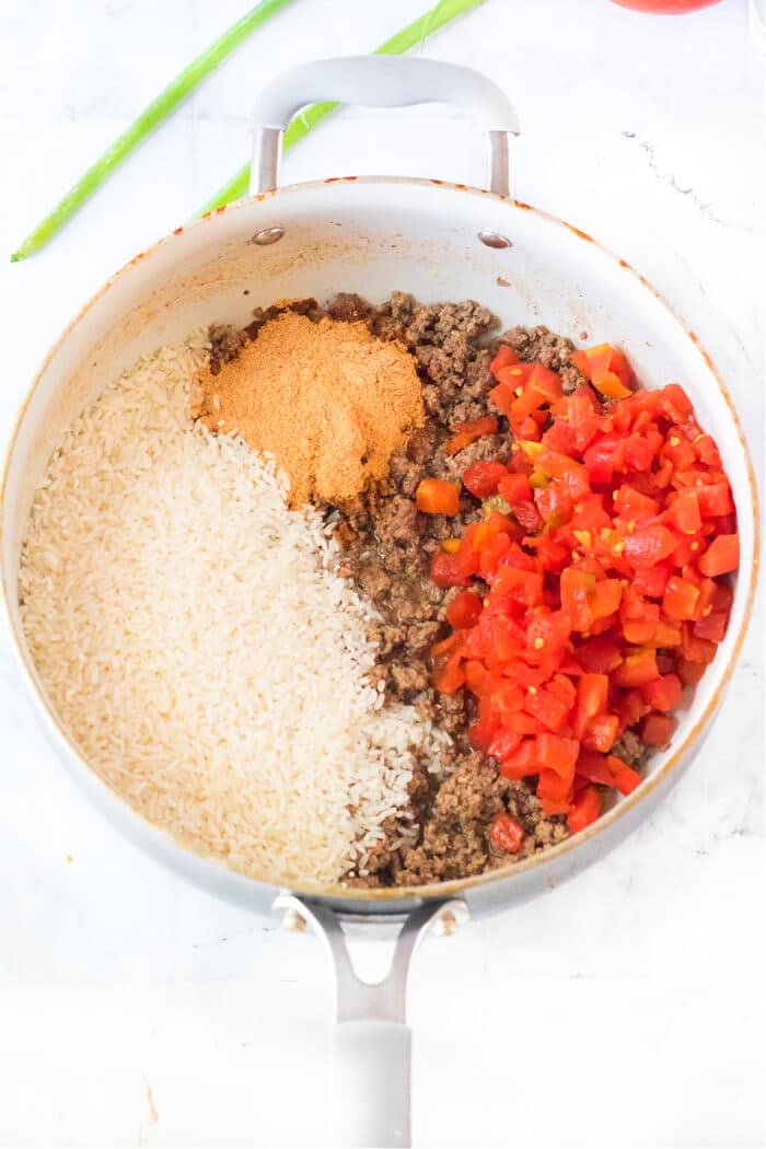 Taco rice is a fantastic one pot meal made with ground beef, taco seasoning, rotel tomatoes, rice and colby jack cheese. HOW DO YOU MAKE TACO RICE