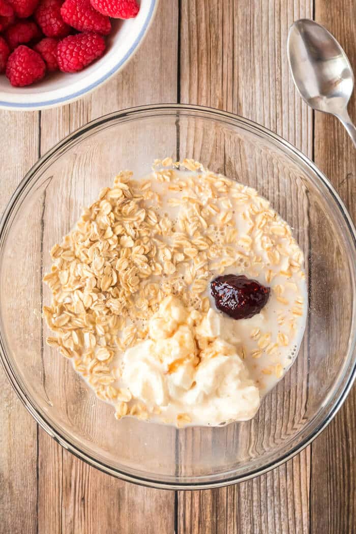 Raspberry overnight oats are a creamy, sweet breakfast made with rolled oats, milk, yogurt and raspberry preserves! HOW TO MAKE RASPBERRY OVERNIGHT OATS
