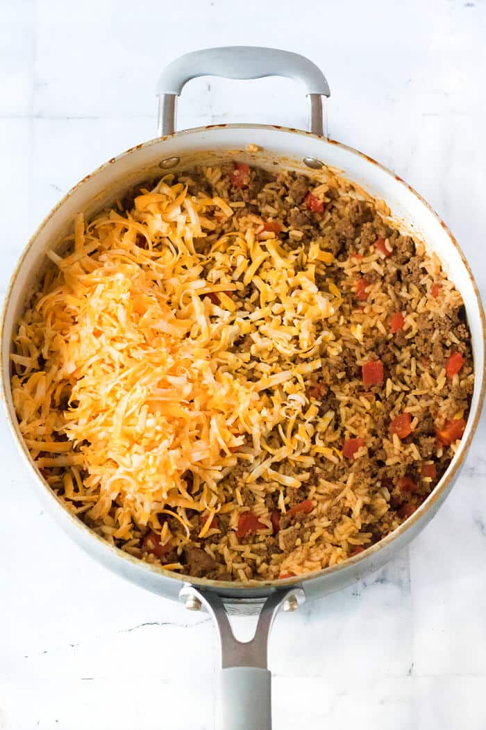 Taco rice is a fantastic one pot meal made with ground beef, taco seasoning, rotel tomatoes, rice and colby jack cheese. HOW TO MAKE TACO RICE