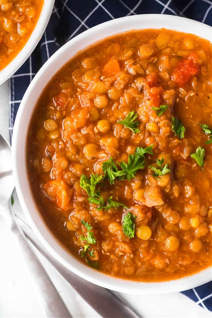 Lentil soup is a flavorful dish made with lentils, celery, carrots, onion, garlic & seasonings for a delicious bowl of soup for a cozy night. LENTIL SOUP RECIPE