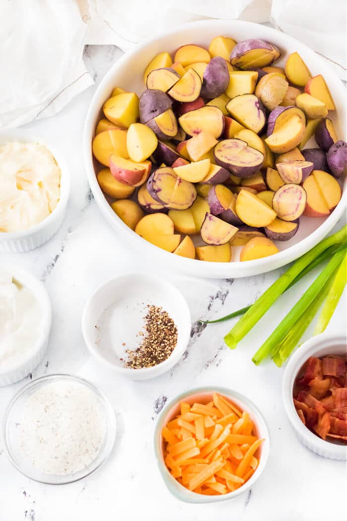Loaded potato salad is a flavorful spin potato salad with potatoes, Ranch seasoning, bacon, shredded cheddar cheese and scallions! LOADED POTATO SALAD INGREDIENTS