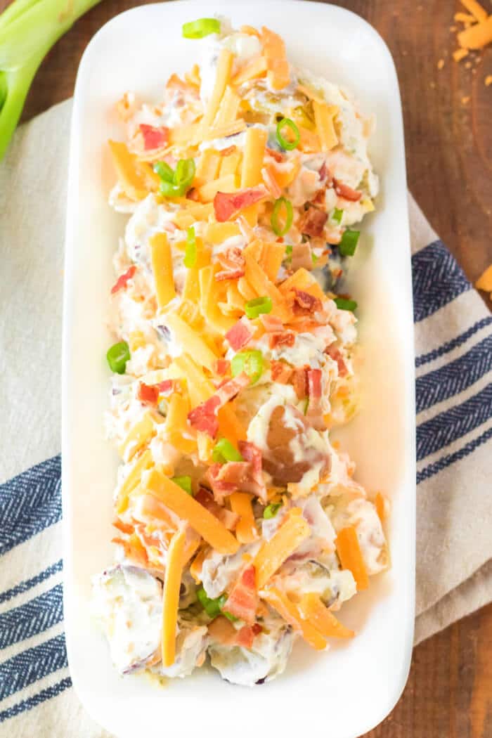 Loaded potato salad is a flavorful spin potato salad with potatoes, Ranch seasoning, bacon, shredded cheddar cheese and scallions! LOADED POTATO SALAD RECIPE