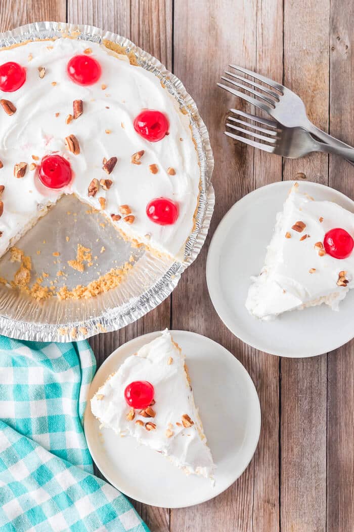 Millionaire pie is a creamy no-bake pie in a graham cracker crust with lemon juice, sweetened condensed milk, pineapple and coconut flakes! MILLIONAIRE PIE RECIPE