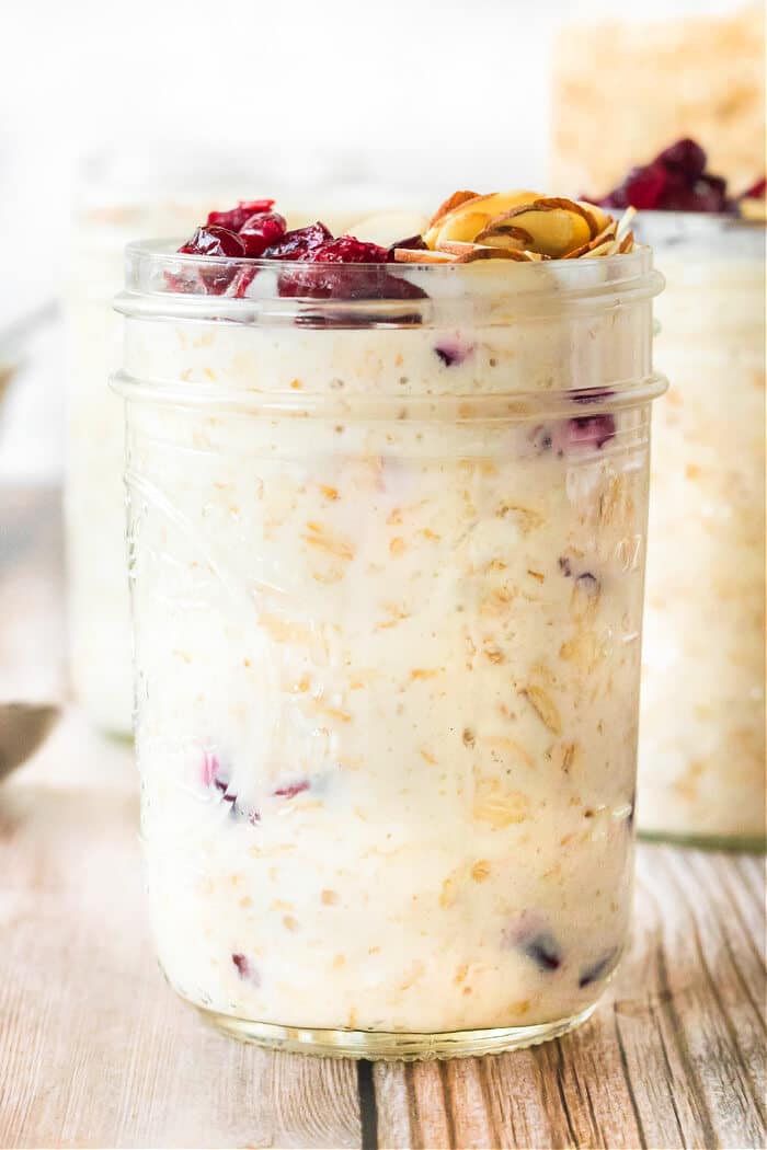 Cranberry overnight oats are an easy breakfast option with oats, yogurt, milk, almond extract and almonds topped with dried cranberries! OVERNIGHT OATS CRANBERRY
