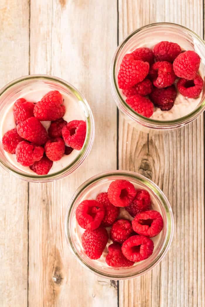 Raspberry overnight oats are a creamy, sweet breakfast made with rolled oats, milk, yogurt and raspberry preserves! OVERNIGHT RASPBERRY OATS