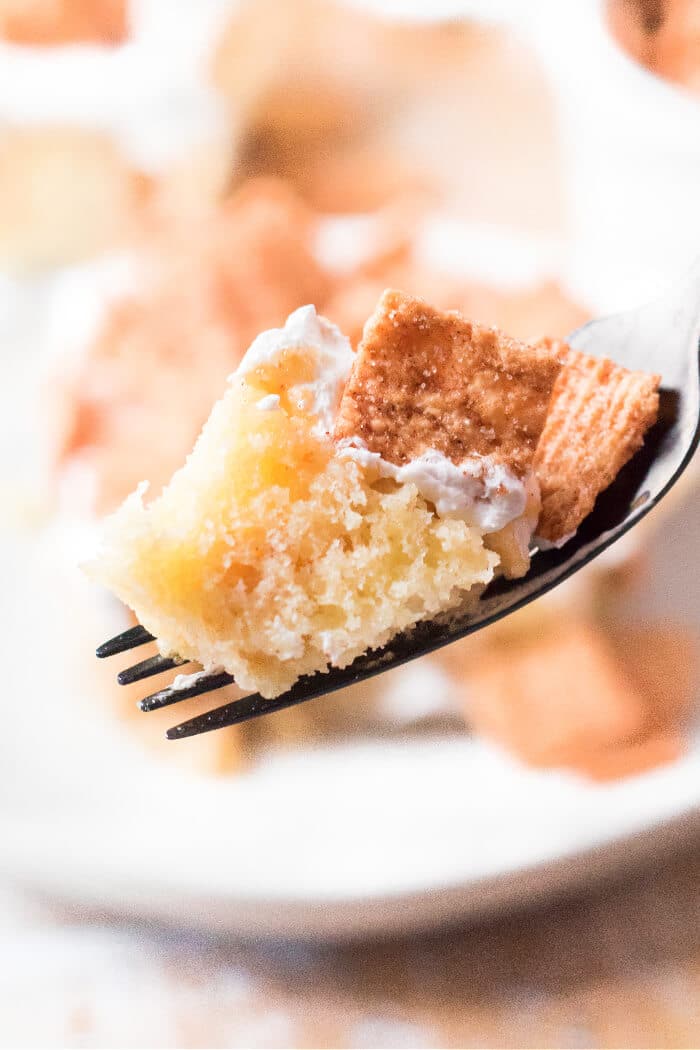 Cinnamon toast crunch poke cake combines cake mix, cinnamon, sweetened condensed milk, whipped topping & cinnamon toast crunch cereal! POKE CAKE WITH CINNAMON TOAST CRUNCH