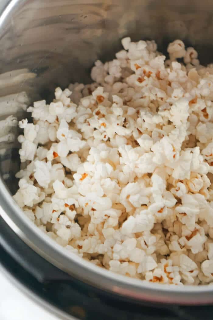 Instant pot popcorn is a simple way to make homemade popcorn right in your instapot with all the flavor and no mess! POPCORN INSTANT POT