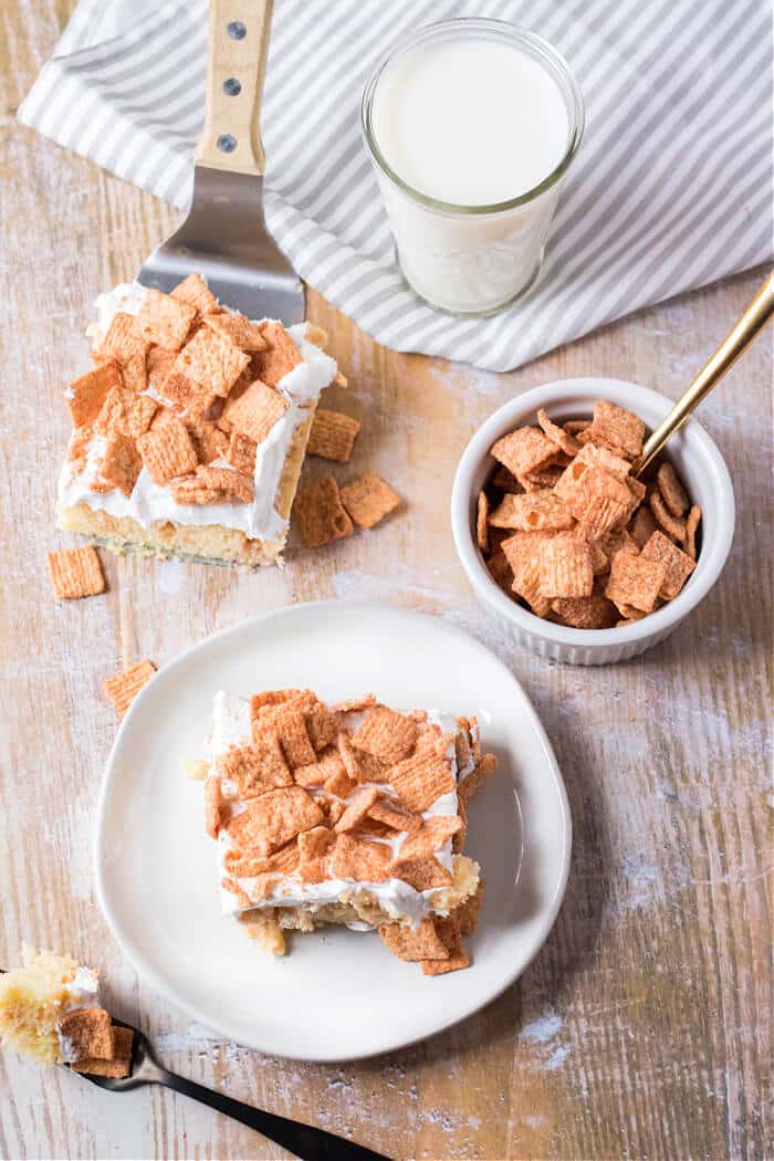 Cinnamon toast crunch poke cake combines cake mix, cinnamon, sweetened condensed milk, whipped topping & cinnamon toast crunch cereal! RECIPE FOR CINNAMON TOAST CRUNCH POKE CAKE