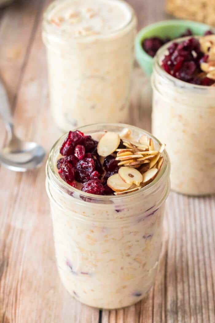 Cranberry overnight oats are an easy breakfast option with oats, yogurt, milk, almond extract and almonds topped with dried cranberries! RECIPE FOR CRANBERRY OVERNIGHT OATS