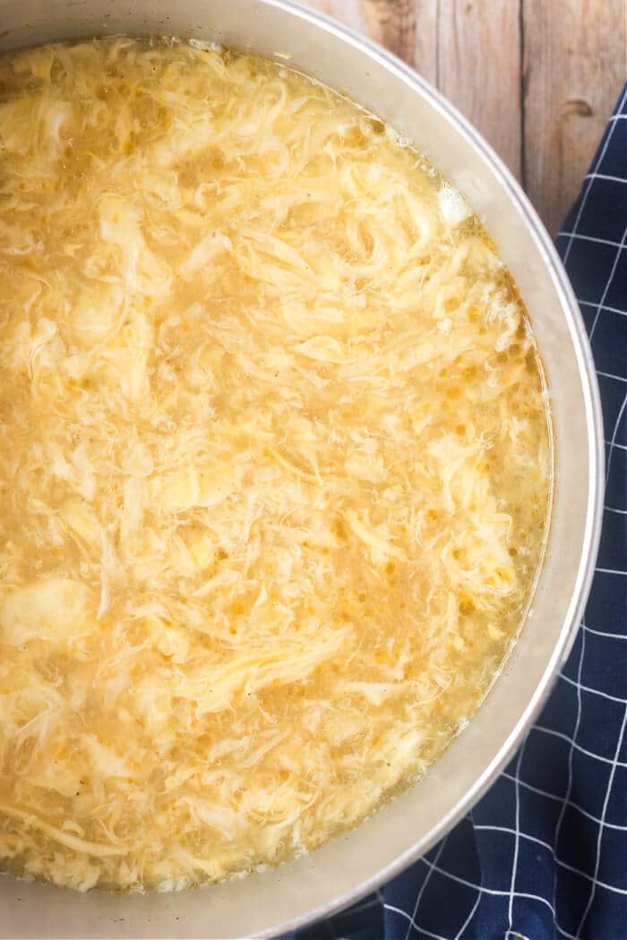 Egg drop soup is a classic dish made with savory broth, ginger, sesame oil and green onions and finished with silky ribbons of egg! CHINESE EGG DROP SOUP