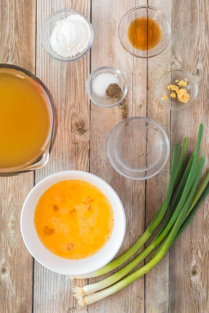 Egg drop soup is a classic dish made with savory broth, ginger, sesame oil and green onions and finished with silky ribbons of egg! EGG DROP SOUP INGREDIENTS