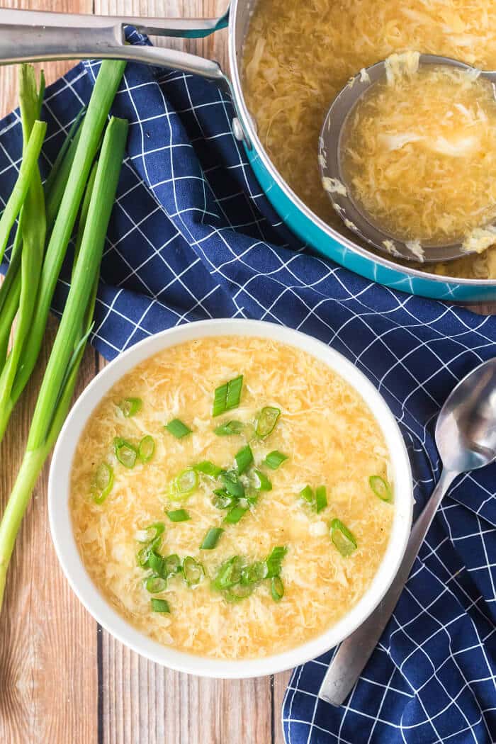 Egg drop soup is a classic dish made with savory broth, ginger, sesame oil and green onions and finished with silky ribbons of egg! EGG DROP SOUP RECIPE