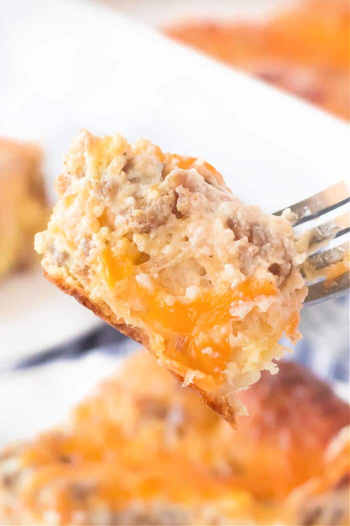 Biscuits and gravy casserole is one of our favorite breakfasts made with breakfast sausage, biscuits and a homemade gravy topped with cheese! RECIPE FOR BISCUITS AND GRAVY CASSEROLE
