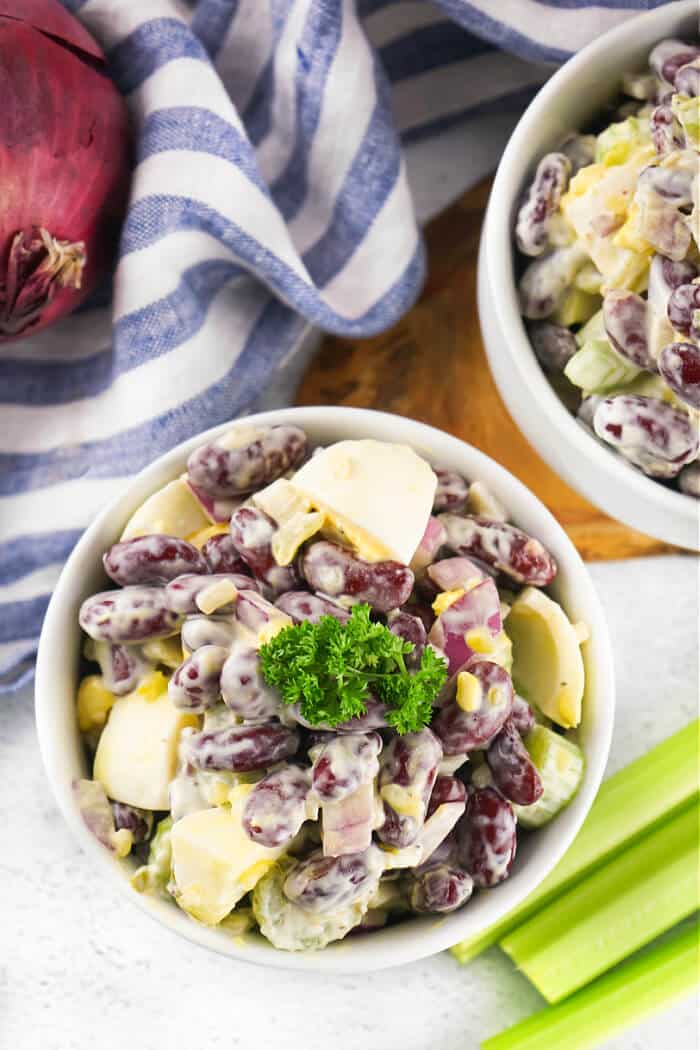 Kidney bean salad is a quick and easy side dish made with red kidney beans, boiled eggs, red onion, celery, mayo, and sweet pickle relish! RECIPE FOR KIDNEY BEAN SALAD