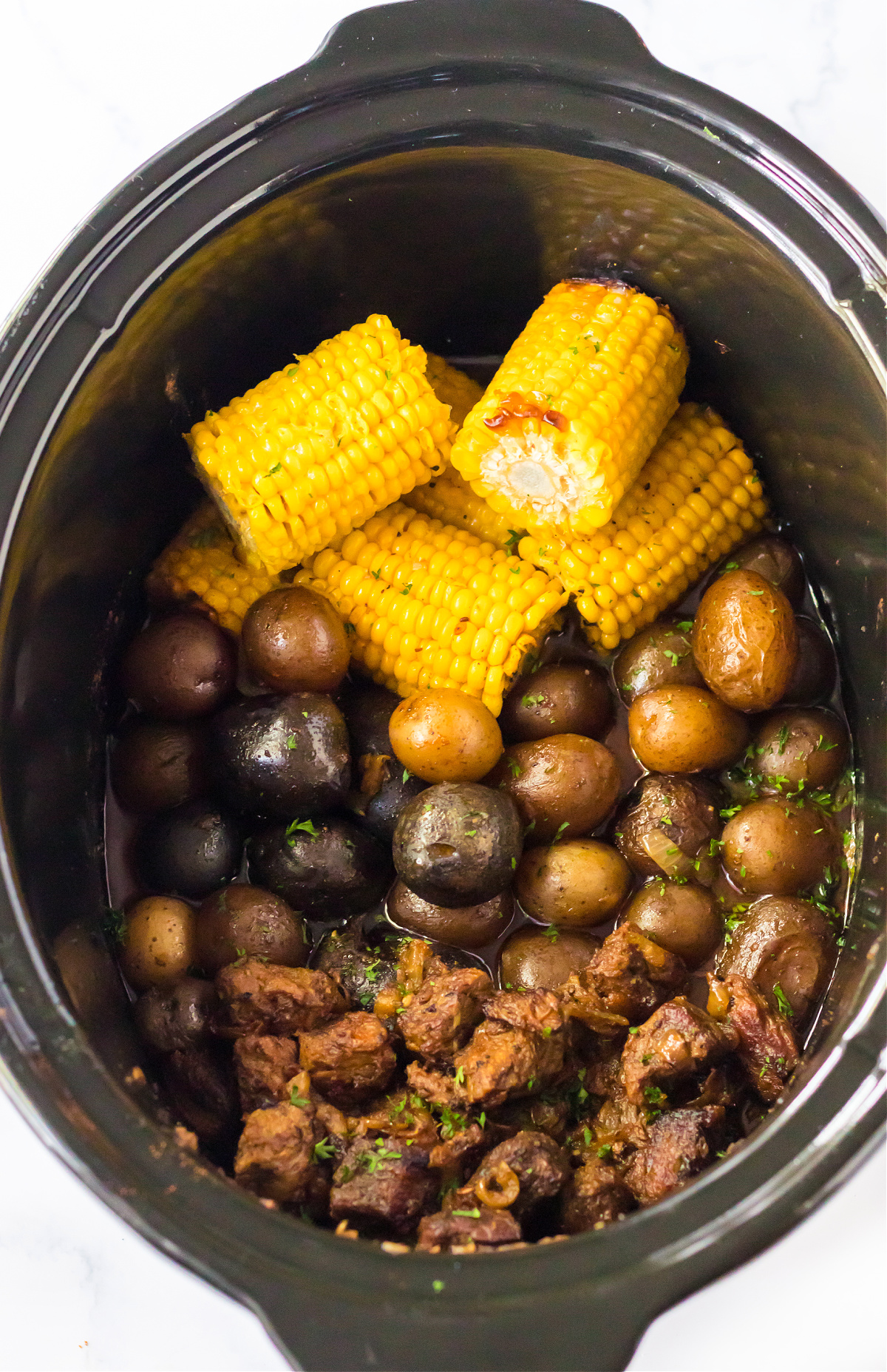 how to make steak potatoes and corn in the slow cooker